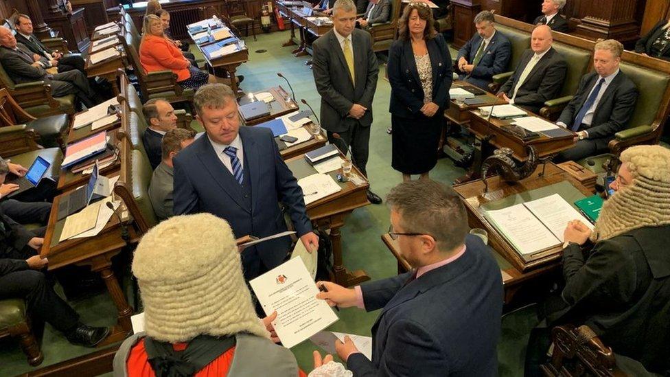 Paul Quine being sworn in