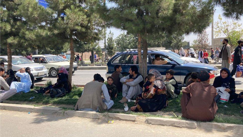 People lining the road en route to the airport in Kabul