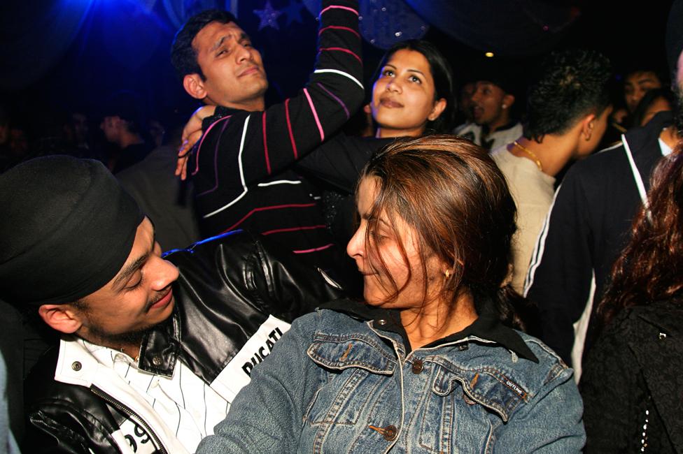 Young British Asians dancing