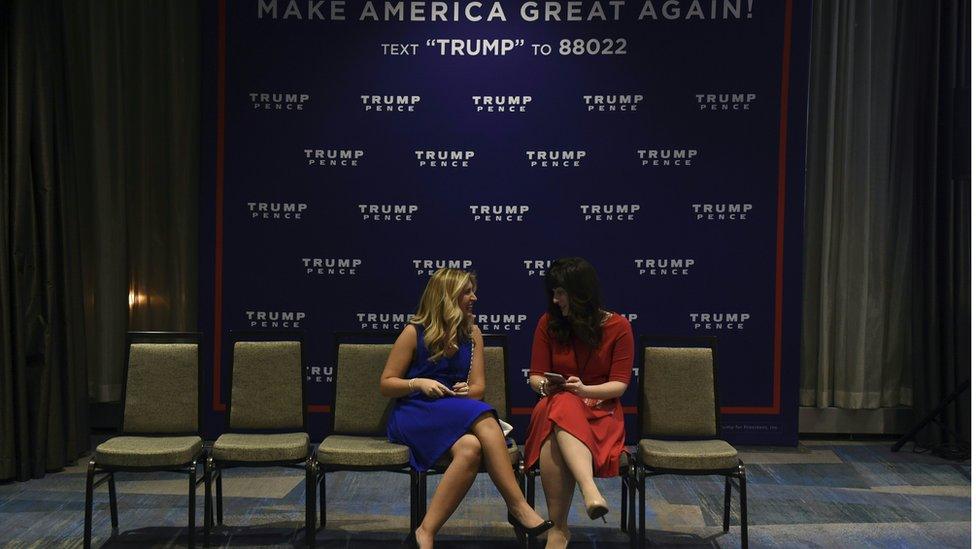 Two women talk ahead of the Trump election night event