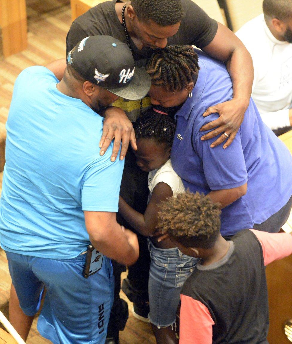 Zianna was comforted by family members after her speech