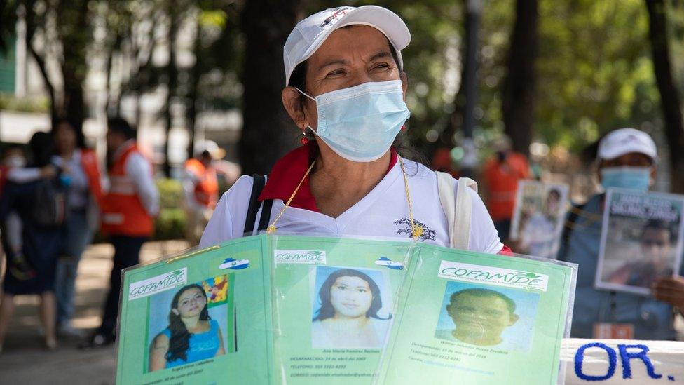 Mothers and relatives of disappeared people of Mexico and Central America carry images of their missing relatives, during a protest demanding justice and help, along Reforma avenue, in Mexico City, Mexico on May 10, 2022.