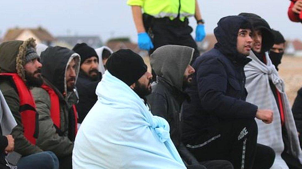 Migrants on Dungeness beach