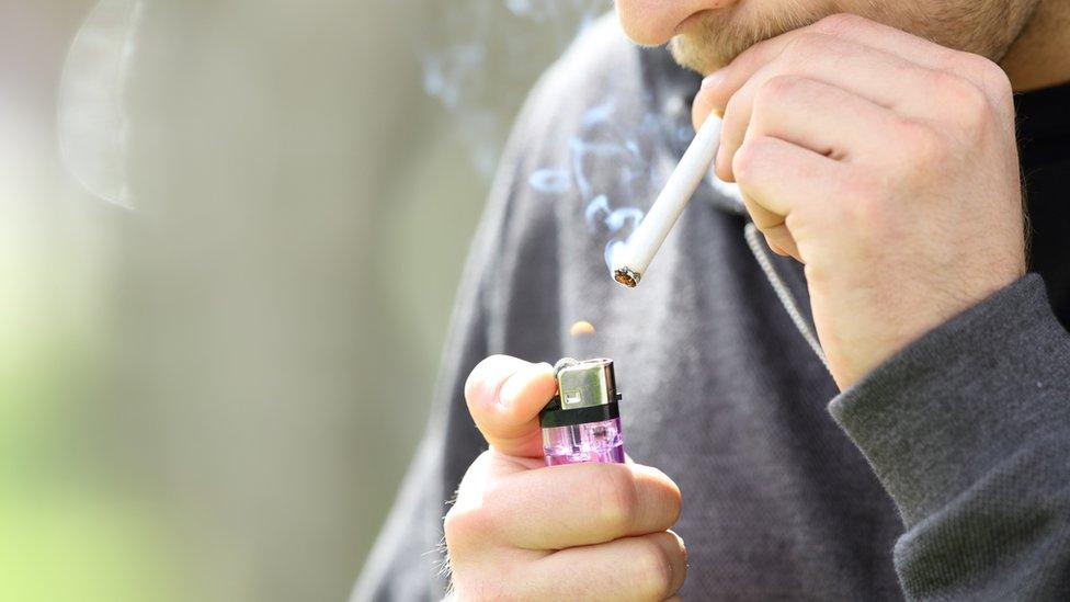 A young man smoking