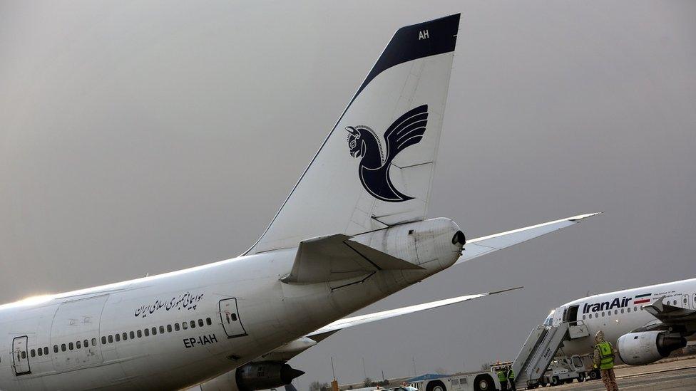 Iran Air passenger planes sit on the tarmac of the domestic Mehrabad airport (file photo)