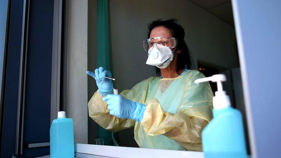 nurse wearing PPE