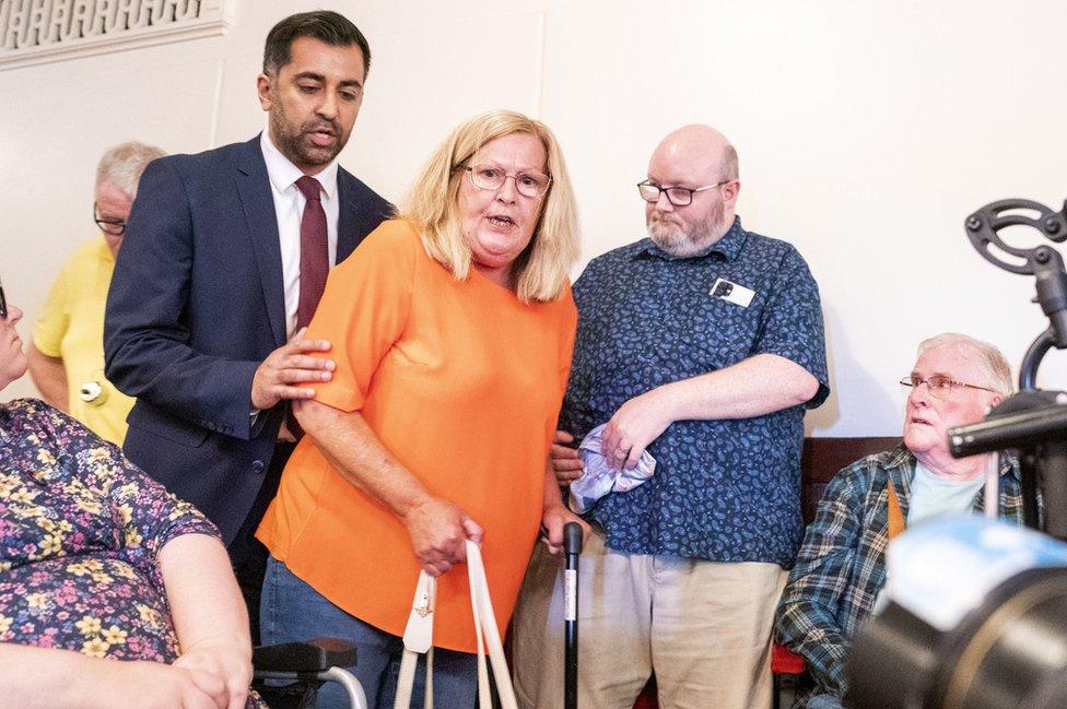 First Minister Humza Yousaf left the podium to speak to protestor Theresa Mallett