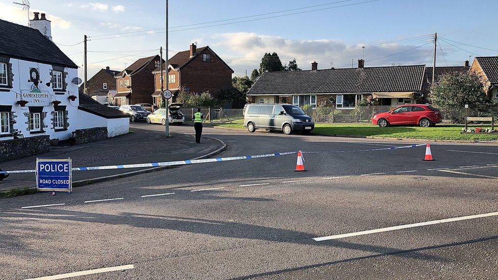 Police tape marking a road closure in Berry Hill