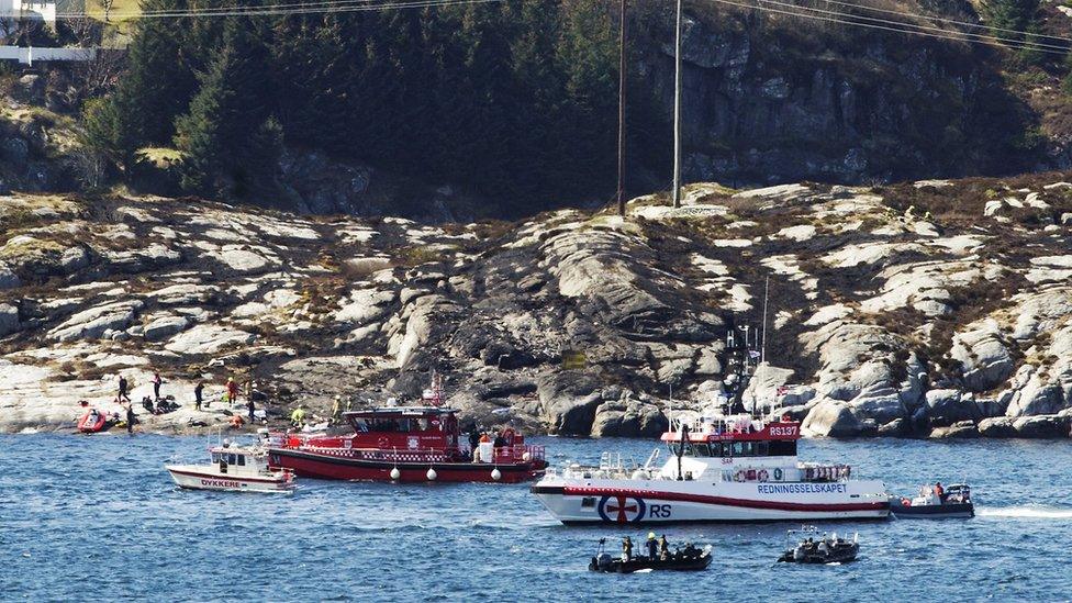 Rescue boats at the scene of the crash