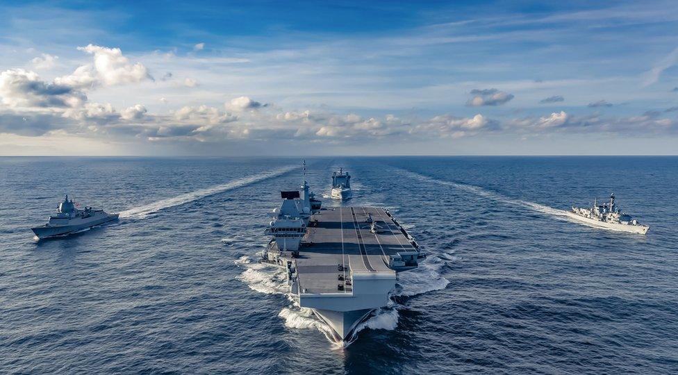 A view of frigate HNoMS Thor Heyerdahl, HMS Queen Elizabeth, submarine hunter HMS Northumberland and tanker RFA Tideforce