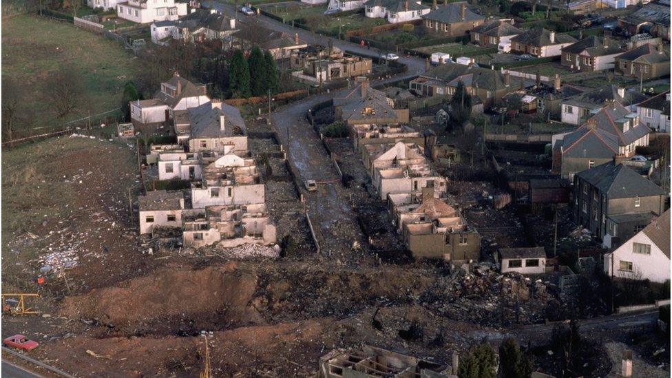 Aircraft debris and destroyed houses in Sherwood Crescent