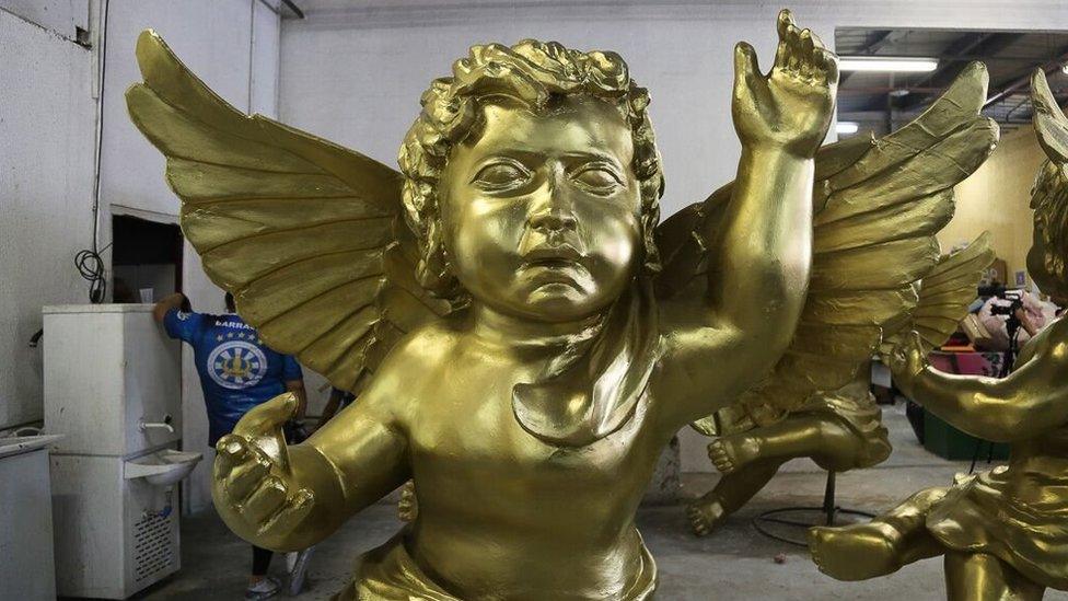 A golden cherub at a samba school