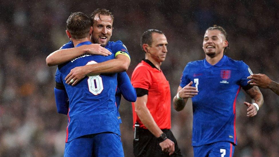 Harry Kane hugging team mate