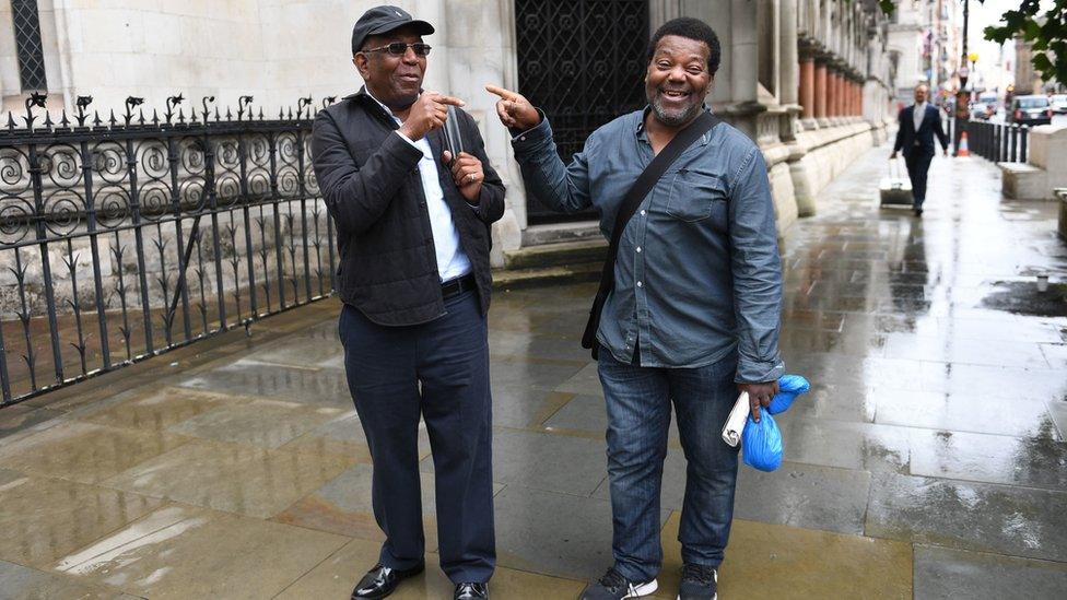 Paul Green (left) and Cleveland Davidson outside the Royal Courts of Justice in London.