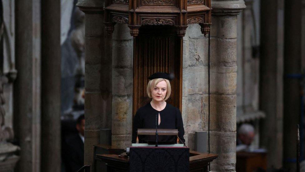 Liz Truss speaking at Westminster Abbey