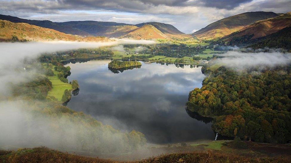 Mist clearing over Grasmere viewed from Loughrigg Hill