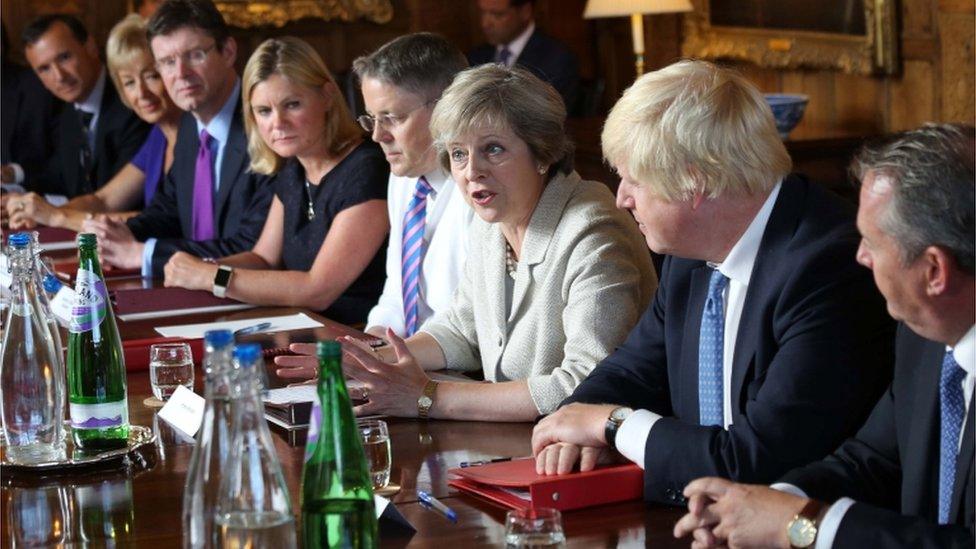 Theresa May chairs a cabinet meeting at Chequers