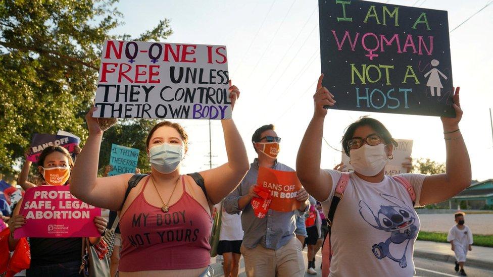 Supporters of reproductive choice take part in the nationwide Women's March in Brownsville, Texas, on 2 October, 2021