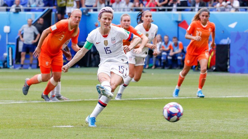 Megan Rapinoe scoring a penalty.