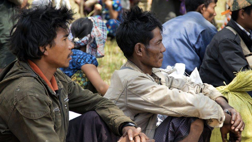 Refugees fleeing the conflict in the China-Myanmar border town of Laukkai await transportation, 7 March 2017