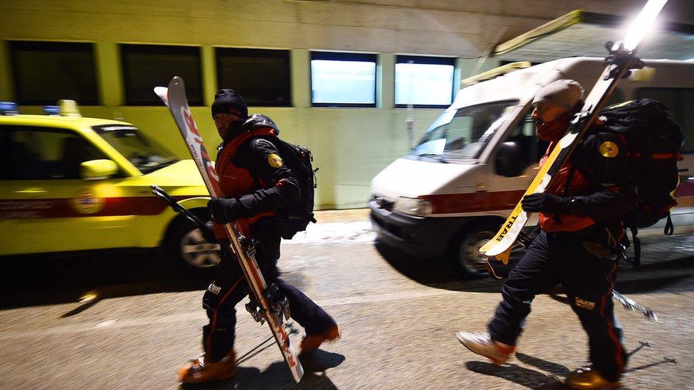 Mountain rescuers arrive in Penne, central Italy, 19 january