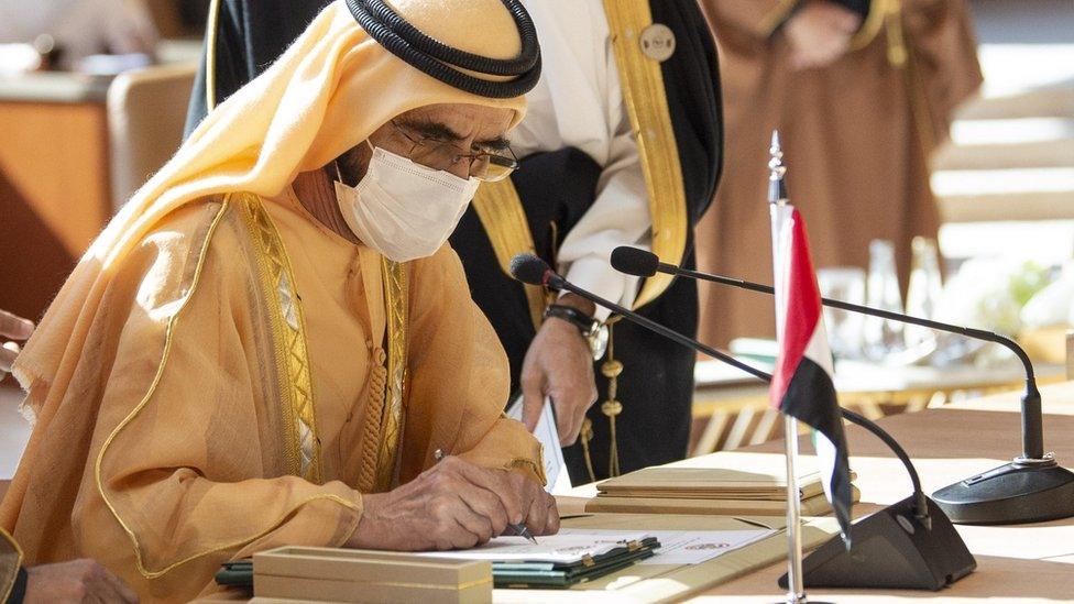 UAE Vice-President and Prime Minister Sheikh Mohammed bin Rashid Al Maktoum signs the al-Ula agreement at the GCC summit in Saudi Arabia (5 January 2020)