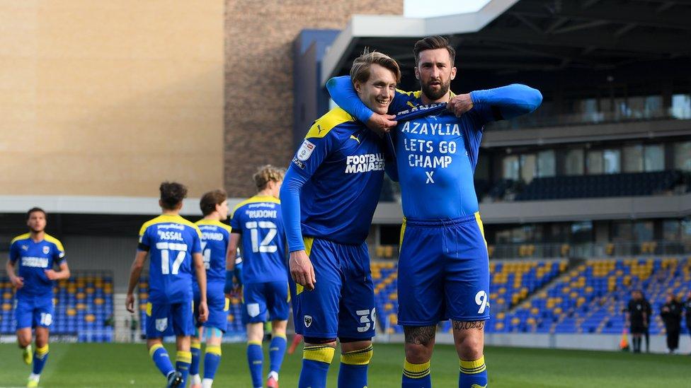 Ollie Palmer and Joe Pigott celebrate a goal