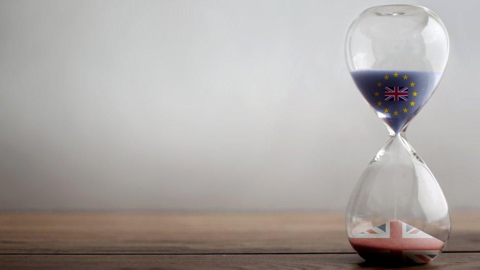 Sand timer running down - sand from UK flag in the EU stars moving to the UK flag by itself.