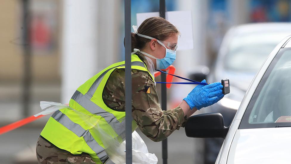 Soldier carrying out Covid test