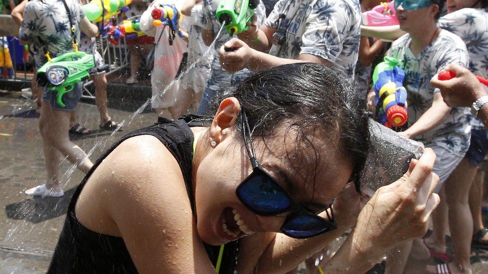 People in Bangkok hold a large water fight