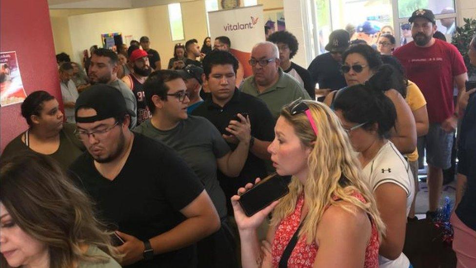 People line up in a local blood bank