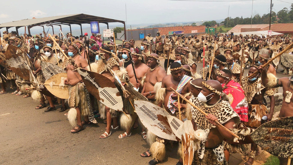 Zulu men in traditional warrior outfits gathered in Nongoma, South Africa - March 2021