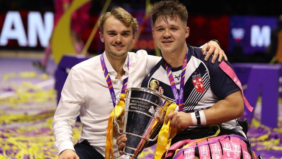 Tom Coyd and Tom Halliwell with World Cup trophy