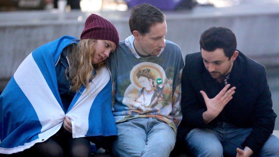 Yes vote campaigners console themselves outside the Scottish Parliament building after the people of Scotland voted no to independence on September 19, 2014 in Edinburgh, Scotland