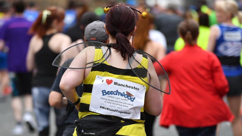 A runner dressed as a bee in the Great Manchester Run