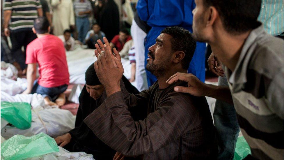 Relative of a victim of the violent crackdown by security forces against supporters of deposed Egyptian President Mohammed Morsi (August 2013)