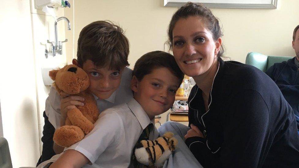 Carly in hospital with her sons Ronnie and Harry