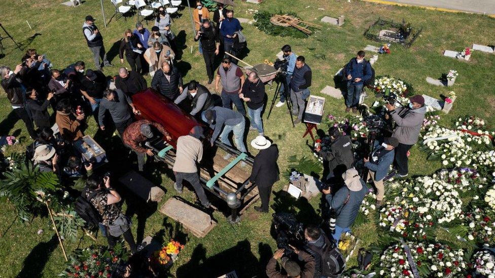 Aerial view of relatives and friends of murdered journalist Lourdes Maldonado during his burial at Monte de los Olivos Cemetery in Tijuana