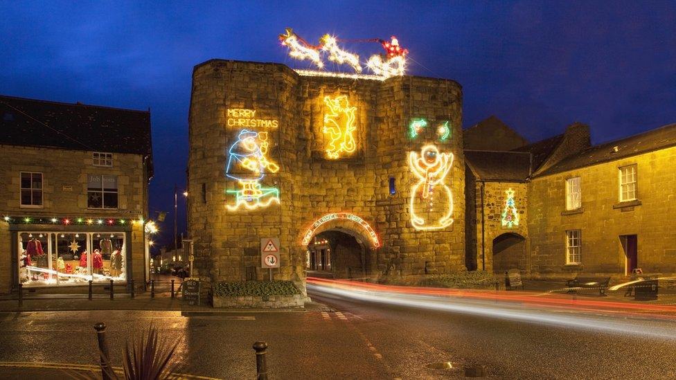 The tower lit up in Christmas lights