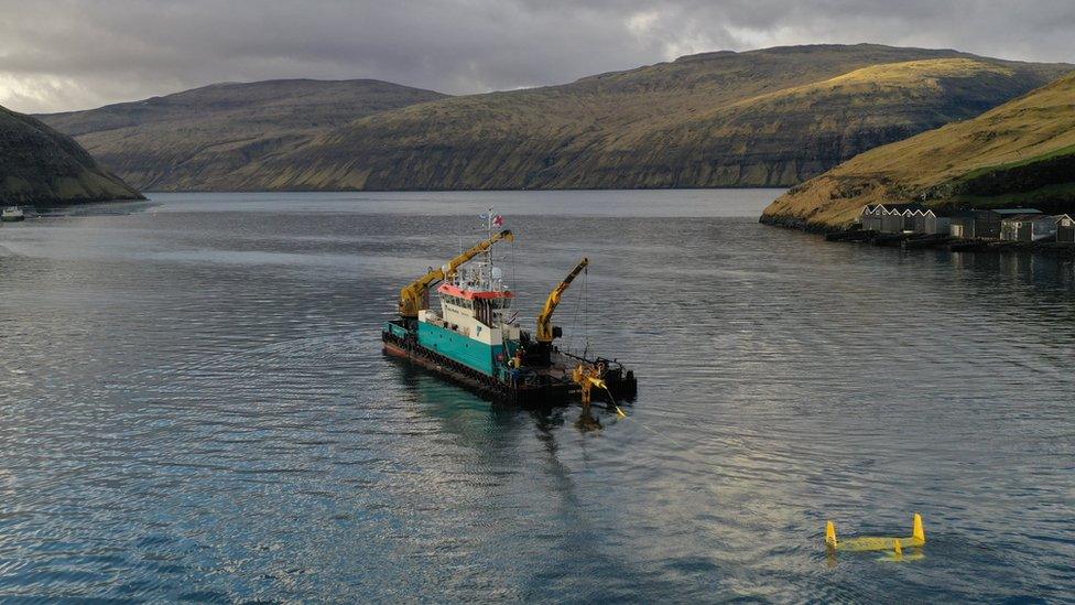 A Minesto underwater kite being transported to its position