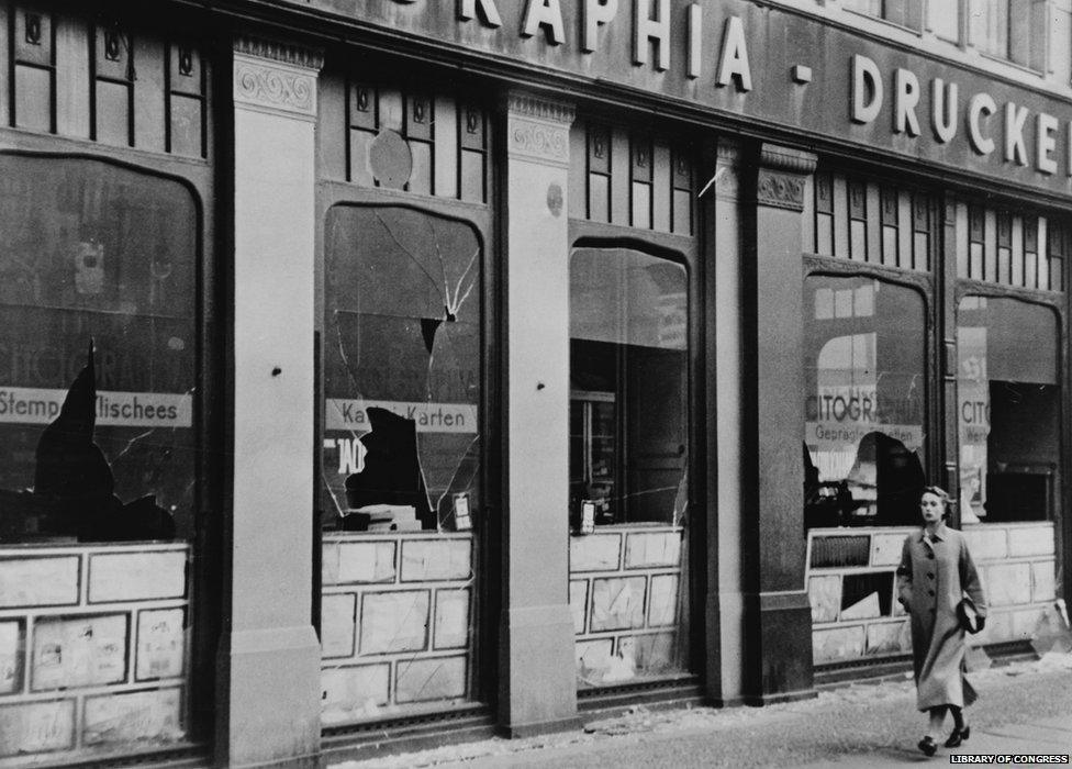 A Jewish-owned shop with smashed windows