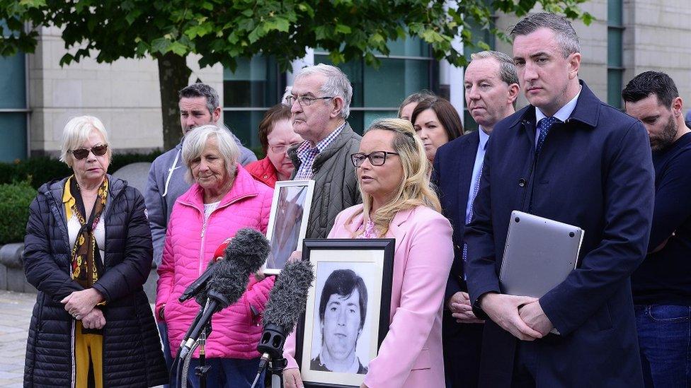 Davina Bolton speaks to journalists after outside a court in Belfast after the announcement of the new inquests