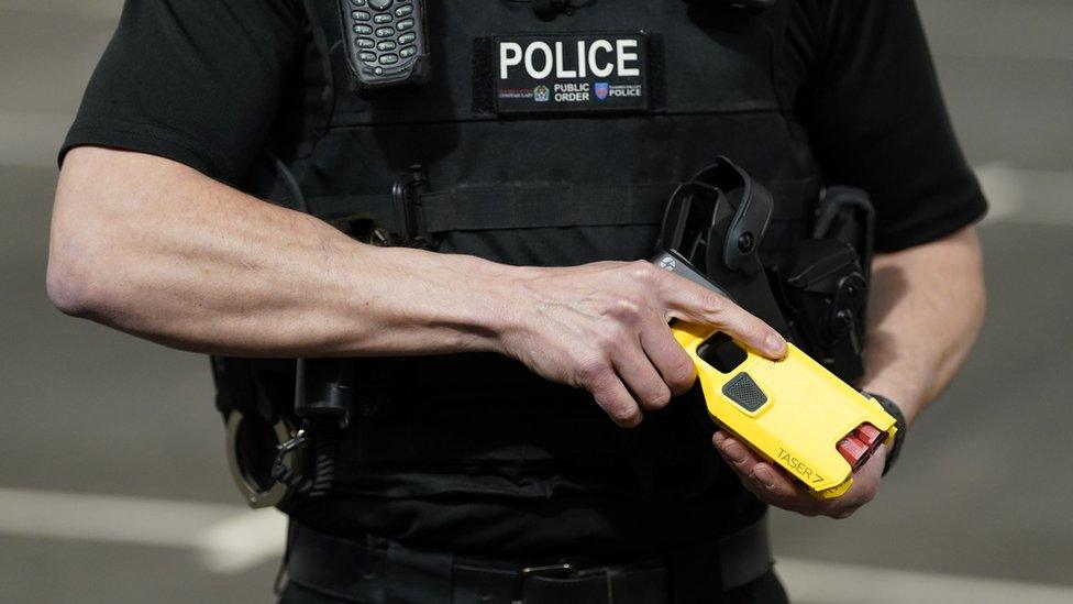 Police with taser