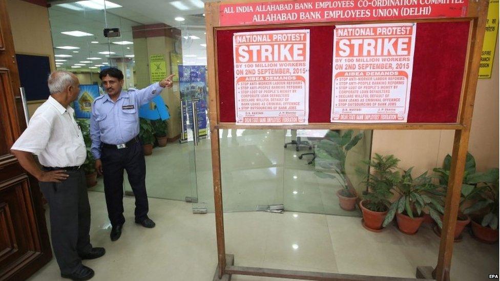 A Security guard stands outside a branch of Allahabad Bank during the nationwide strike called by the Trade Unions in New Delhi, India, 02 September 2015