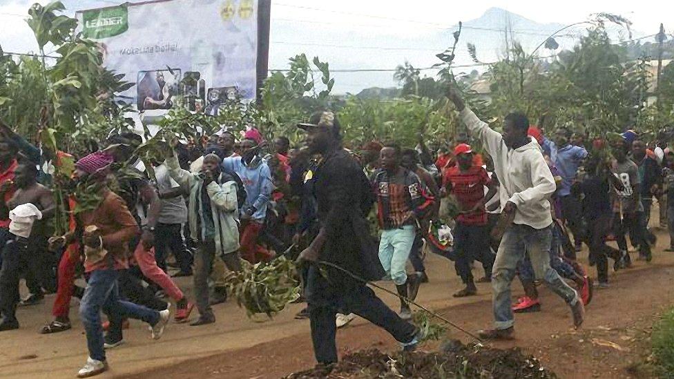 Demonstrators march during a protest against perceived discrimination in favour of the country's francophone majority in Bamenda, Cameroon - September 2017