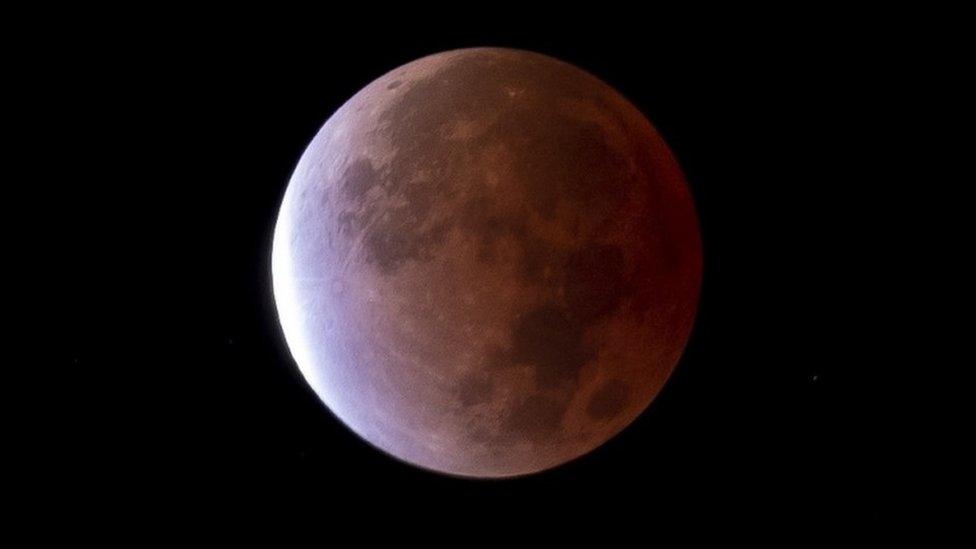 This was the longest partial lunar eclipse in five hundred and eighty years, giving the moon reddish hues and appearing in North America, parts of South America, Asia and Australia.