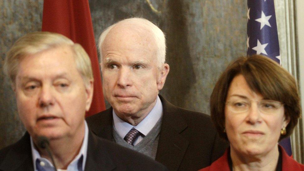 U.S. Senators John McCain (C), Lindsey Graham (L) and Amy Klobuchar (R) at a press conference after meeting with Latvia"s President Raimonds Vejonis in Riga, Latvia, 28 December 2016. Senior US Republican senators are meeting with heads of state and top defence officials in the Baltic states to discuss regional security and NATO plans.