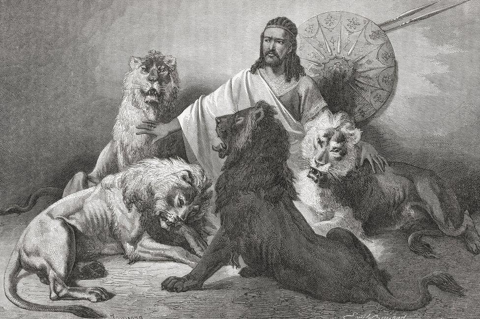 Tewodros II, Emperor Of Ethiopia, sits surrounded by lions. Taken from El Mundo En La Mano, published in 1875.