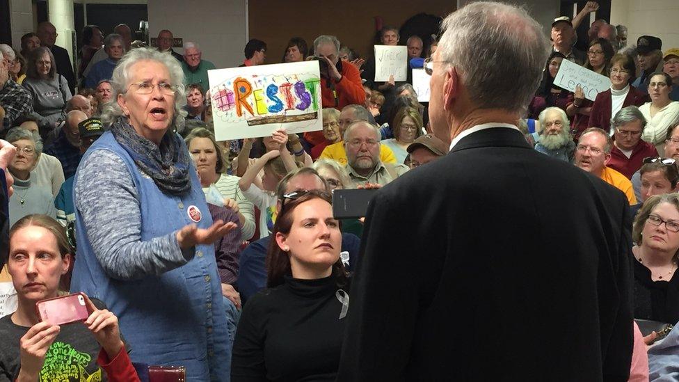 Woman talking to Grassley