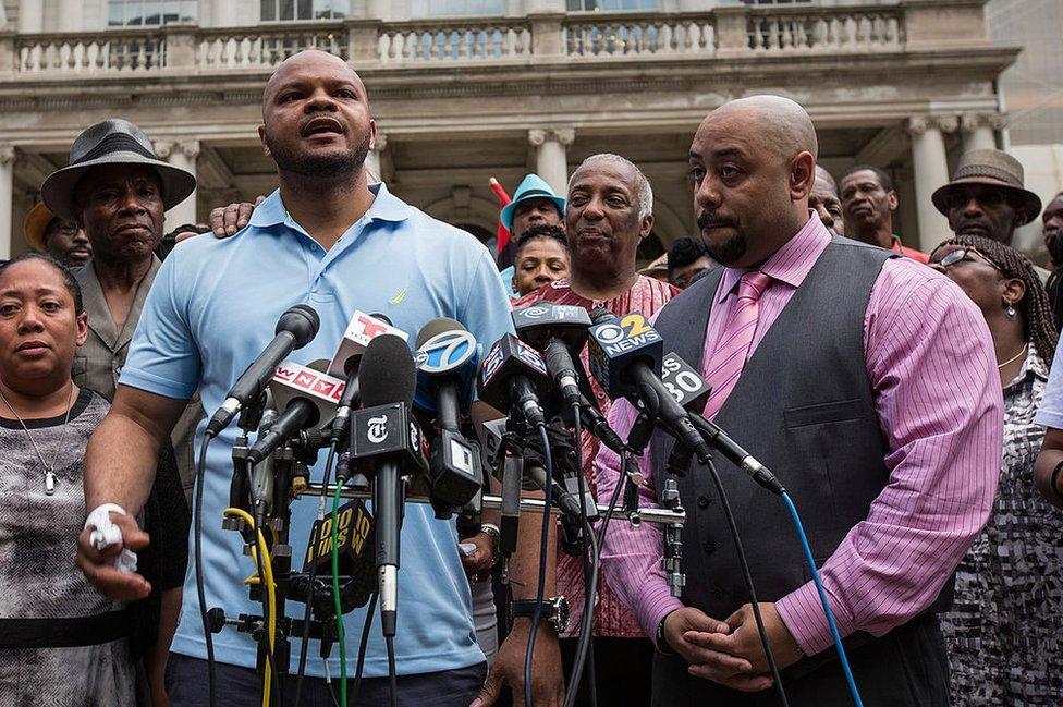 Kevin Richardson (right) and Raymond Santana discuss their settlement with the city